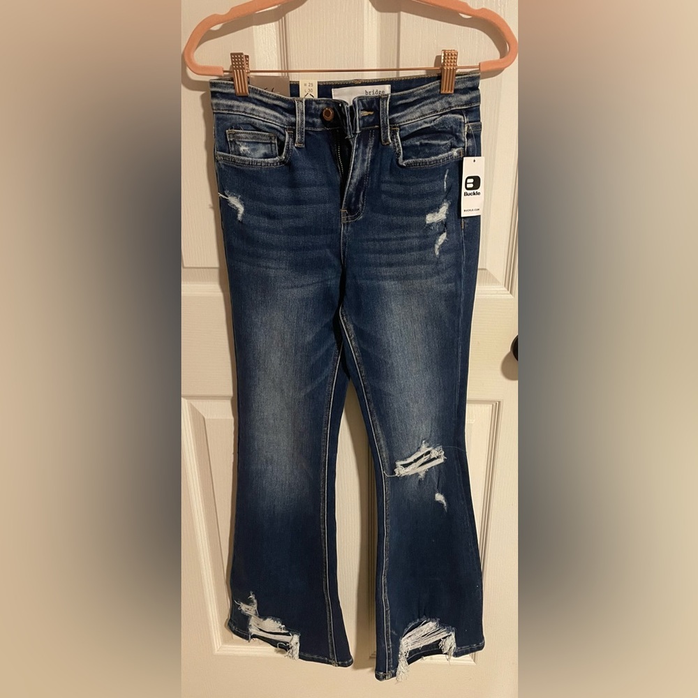 Buckle Women's Distressed Blue Jeans